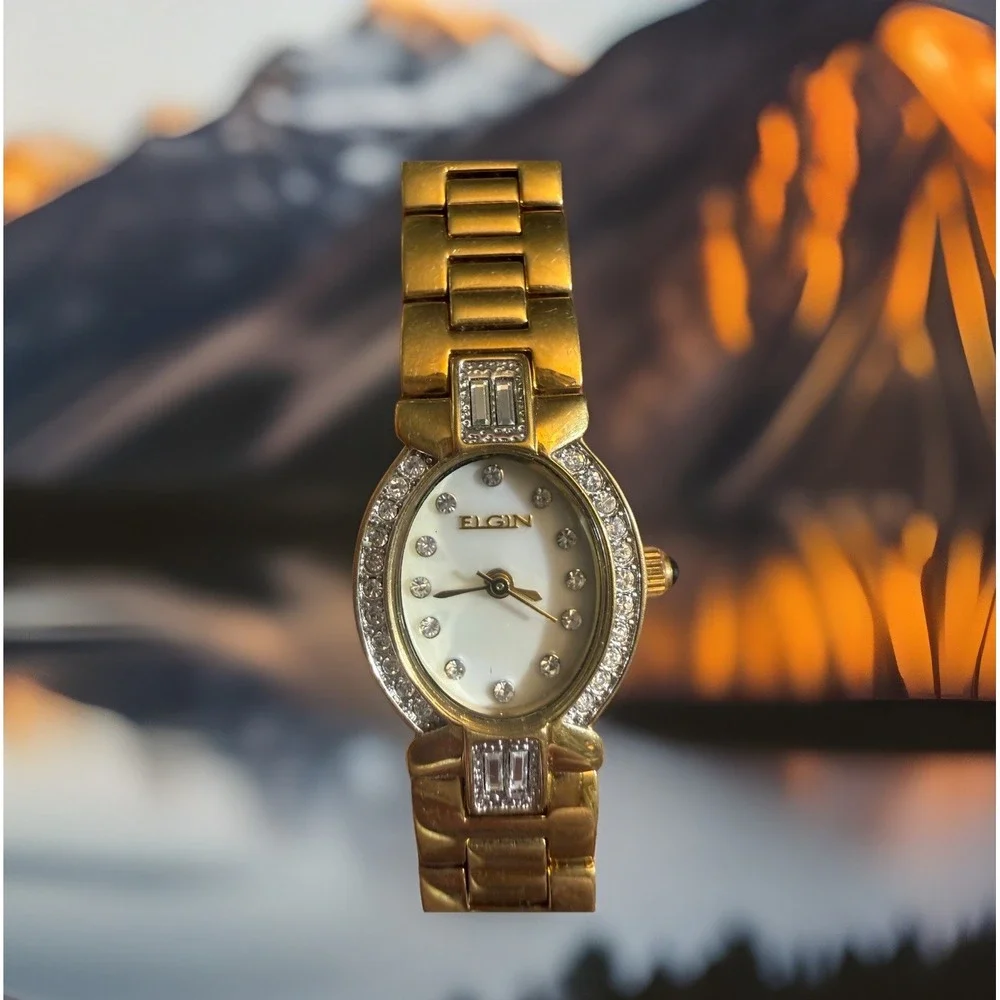 Elgin Women's Gold Tone Oval Quartz Watch White Dial Rhinestone Bezel